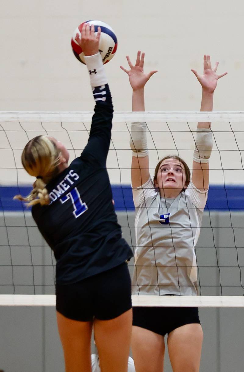 Newman's Makenzie Duhon takes a shot on Princeton's Karsyn Brucker Tuesday night at Prouty Gym.