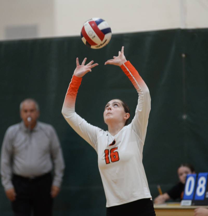 Byron's Kallie Yianibas (16) sets the volleyball during Saturday, Sept. 14, 2024 action at the Varsity Power Classic Tournament at Byron High School.