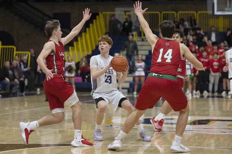 Dixon’s Austin Hicks looks to pass against LaSalle-PeruWednesday, Feb. 21, 2024 at the Sterling class 3A basketball regional.