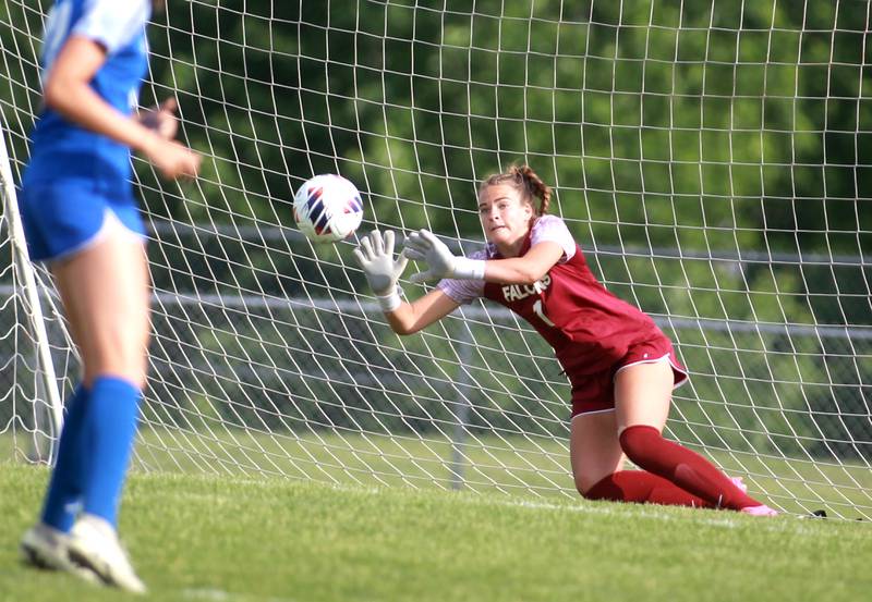 Wheaton North goal keeper Zoey Bohmer makes a save during a Class 3A South Elgin Sectional semifinal game against Geneva on Tuesday, May 21, 2024.