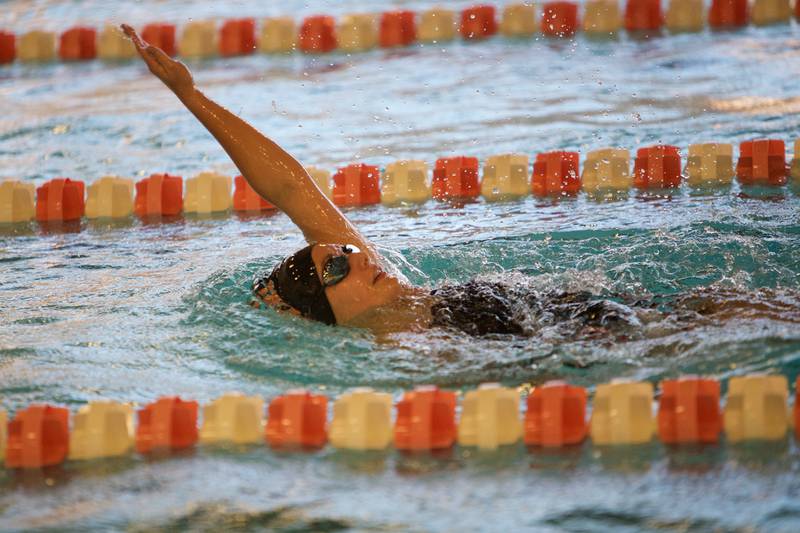DeKalb - Sycamore's Grace Schoen competes in the 100 Yard Backstroke at the DeKalb - Sycamore co-op swim meet on Thursday, Sept.30,2022 in DeKalb.