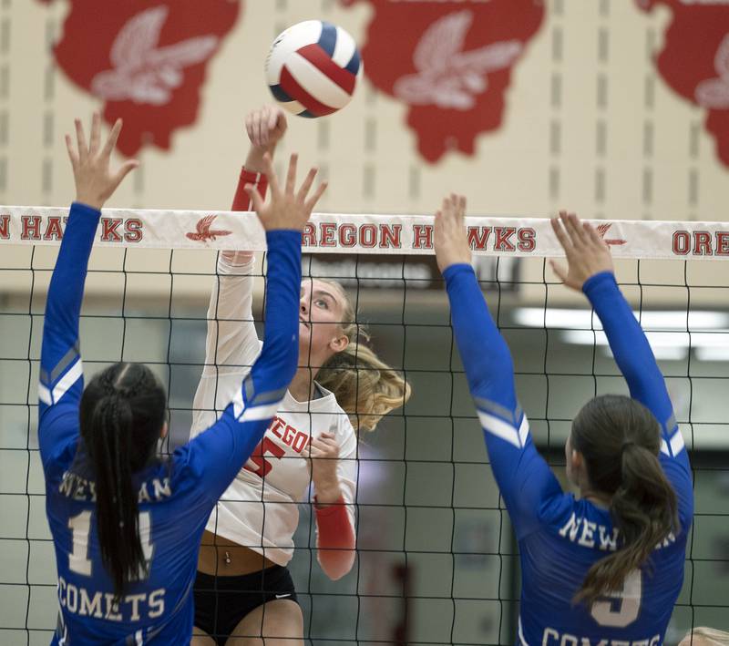 Oregon’s Skylar Bishop spikes against Newman Thursday, Sept. 12, 2024, at the Blackhawk Center in Oregon.