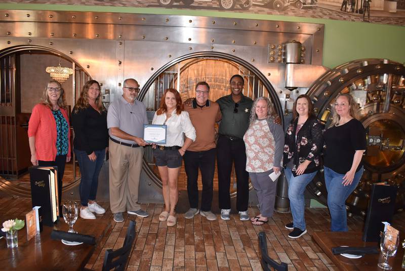 (From left) Judy Booze, ambassador of the Streator Chamber of Commerce; Dana Stillwell, board member of the Streator Chamber; Pete Honiotes, Chamber Board president; Stephanie and Rick Wilkinson, owners of Gaetano's Vault; Jamal Jones, manager of Gaetano's; Jeanne McMenamin, Chamber administrator; Carri Pedelty, Chamber ambassador; and Amber Miller, Chamber committee member pose for a photo after Gaetano's Vault was named August 2024 Business of the Month.