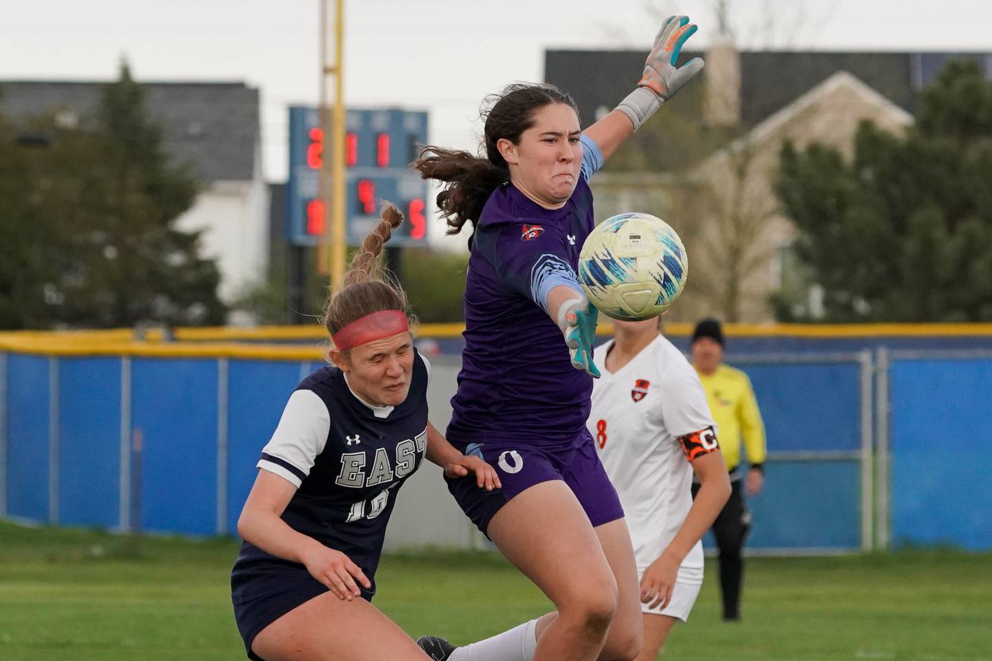 Oswego’s Kyla Baier (0) saves the ball against Oswego East during a soccer match at Oswego East High School on Tuesday, April 23, 2024.