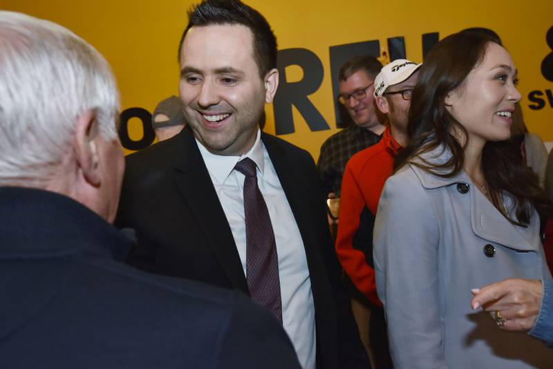 Jerry Evans thanks supporters at his election watch party at Global Brew Tap House in St. Charles on Tuesday night, March 19, 2024. At right is his wife Lisa.