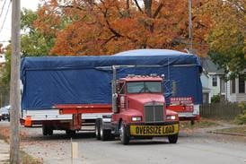 Photos: Unusual sight as house on tractor trailer driven through Sycamore, DeKalb