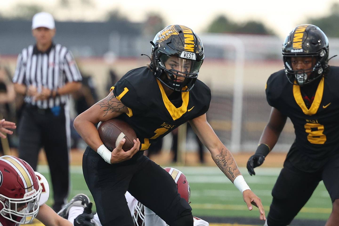 Joliet West’s Antoine Brooks scrambles against Morris on Friday, Sept. 6, 2024 in Joliet.