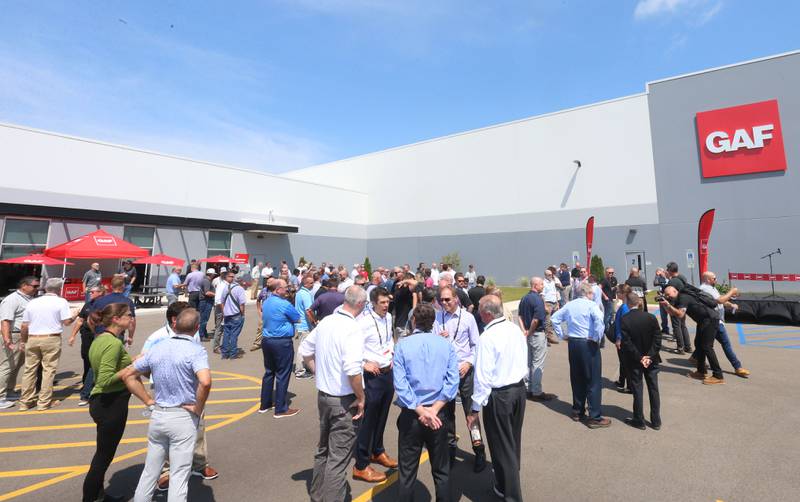 Around 200 people gathered during a grand opening celebration at the GAF facility on Tuesday, July 16, 2024 in Peru.