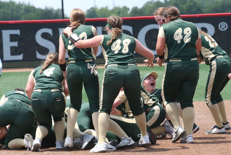 Members of the St. Bede softball team celebrate in the infield after winning the Class 1A State championship over Illini Bluffs on Saturday, June 3, 2023 at the Louisville Slugger Sports Complex in Peoria.