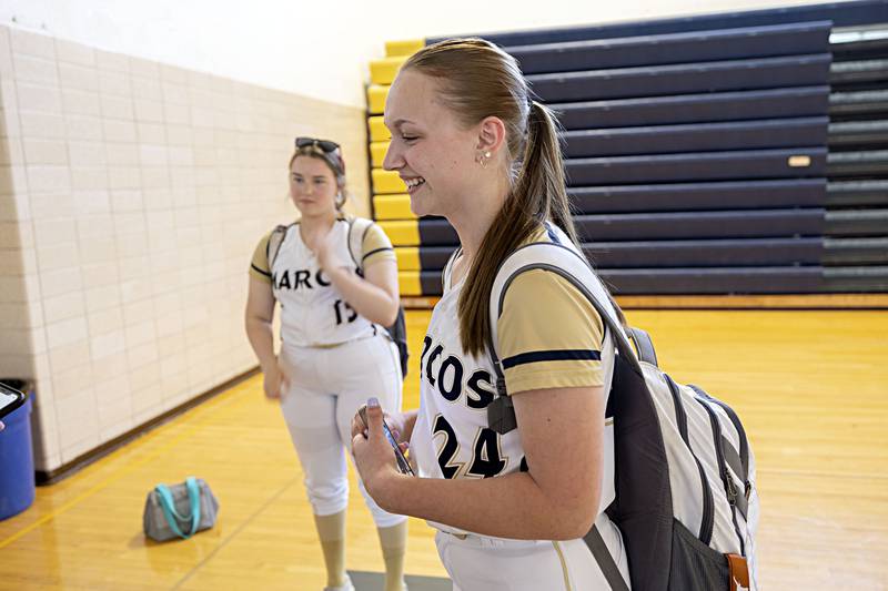 Polo student/athletes Courtney Bushman (left) and Ali Danekas talk about coach and teacher Emily Joines.