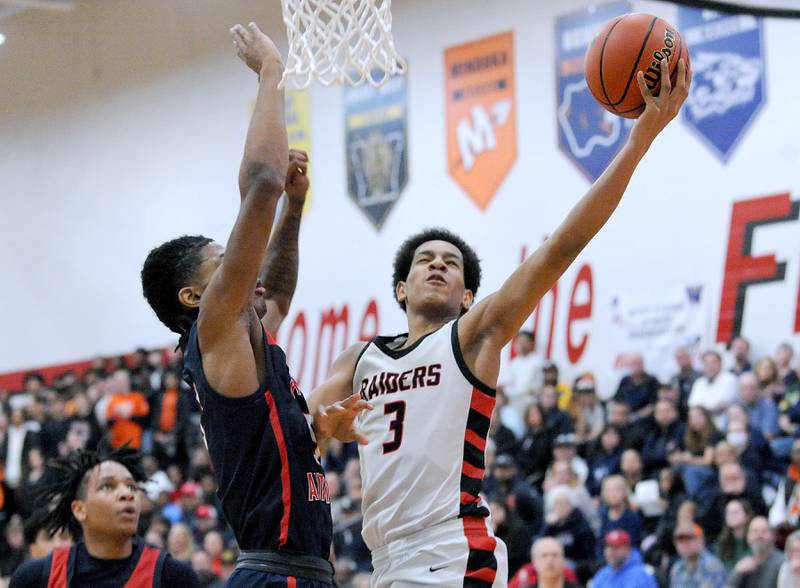 Bolingbrook's Davion Thompson (3) takes a layup against the West Aurora defense during a class 4A regional championship basketball game at Yorkville High School on Friday, Feb. 23, 2024.