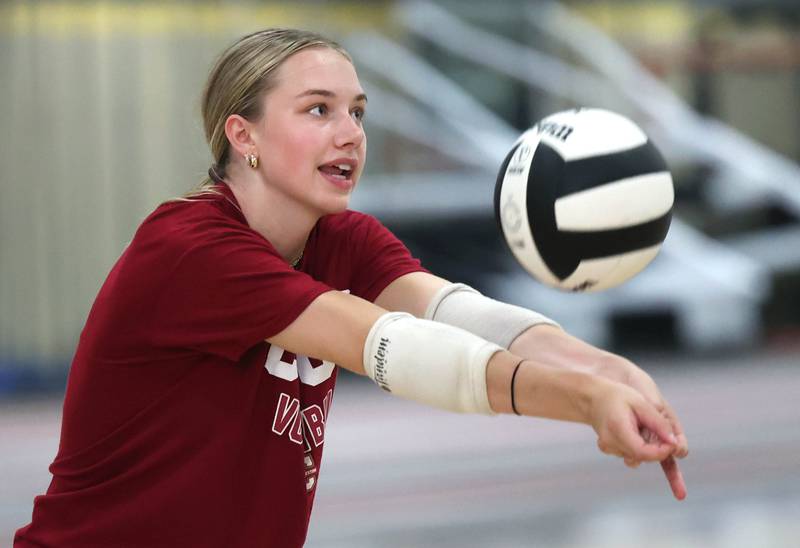 Ava Carpenter bumps the ball during a drill at Sycamore High School volleyball camp Tuesday, July 23, 2024, at Sycamore High School.