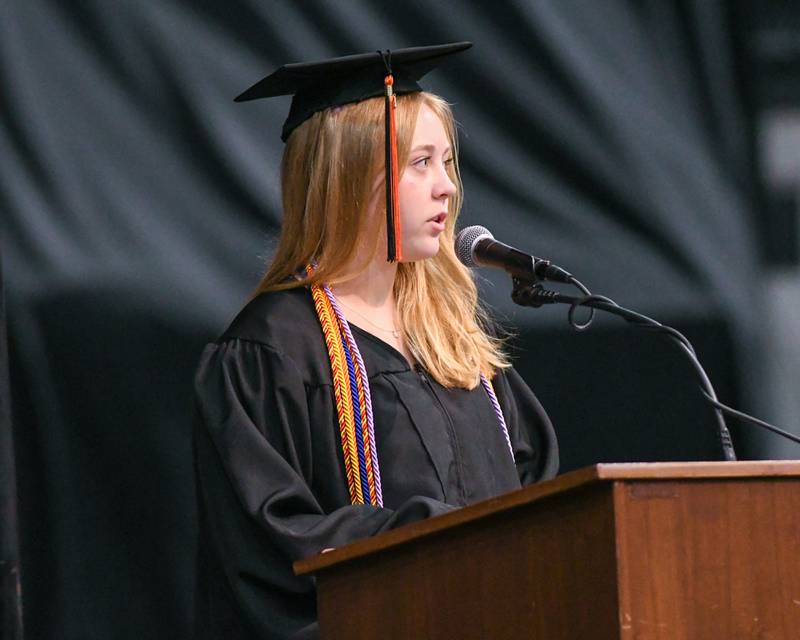 DeKalb High School graduate Mylee Feeney gives her commencement speech on Saturday, May 25, 2024, at the Northern Illinois University Convocation Center in DeKalb.