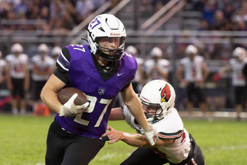 Dixon’s Eli Davison picks up yards against Stillman Valley Friday, Aug. 30, 2024 at Dixon High School.