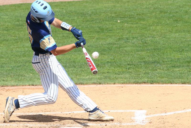 Marquette's Alec Novotney smacks a hit against Routt during the Class 1A semifinal game on Friday, May 31, 2024 at Dozer Park in Peoria.