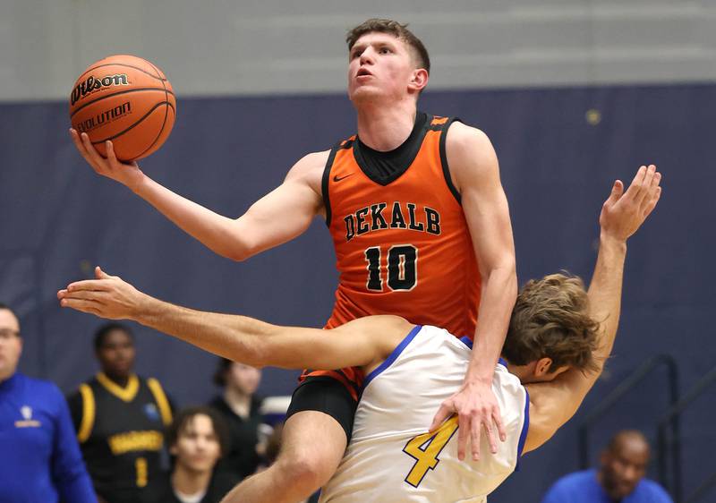 DeKalb’s Eric Rosenow is fouled by Warren's Jack Wolf Tuesday, Feb. 27, 2024, during their Class 4A sectional semifinal game at Rock Valley College in Rockford.