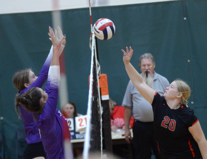 Fulton's Kylie Smither (20) wins the tip at the net against Rochelle during Saturday, Sept. 14, 2024 action at the Varsity Power Classic Tournament at Byron High School.