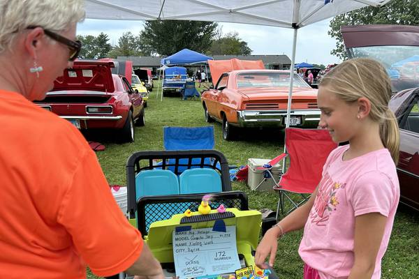 Day of 1st for two families and their rides at Hib Reber Memorial Car Show in Byron