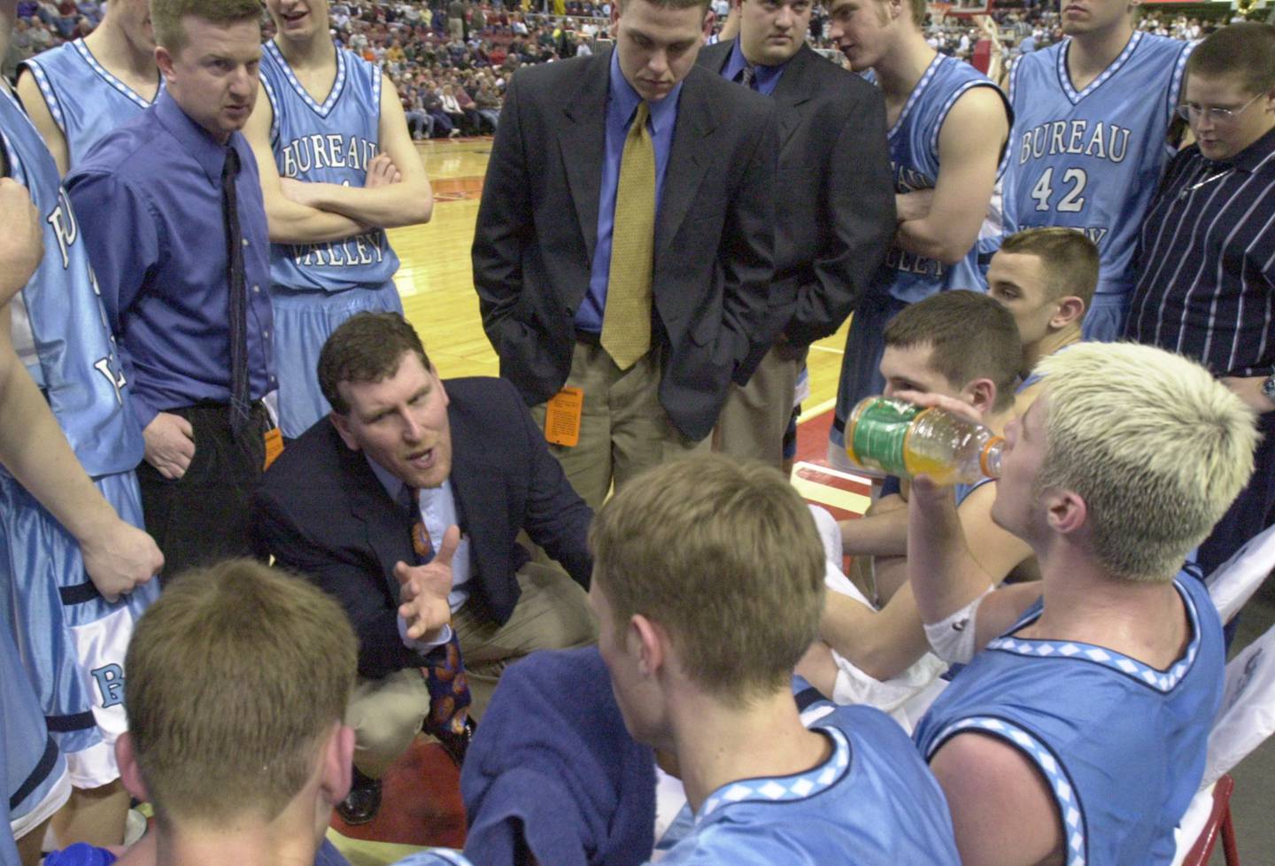 Bureau Valley coach Brad Bickett works the Storm bench during a timeout in the 2000-01 IHSA Class A State Basketball Tournament.
