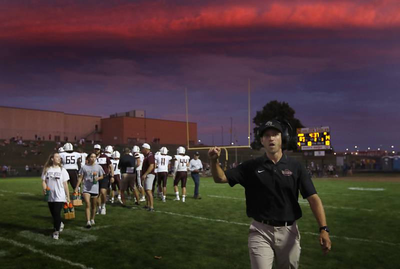 Prairie Ridge first hear head coach Michael Frericks calls for the offense to be ready after a Jacobs timeout  during a Fox Valley Conference football game against Jacobs on Friday, Aug 30, 2024, at Jacobs High School in Algonquin.