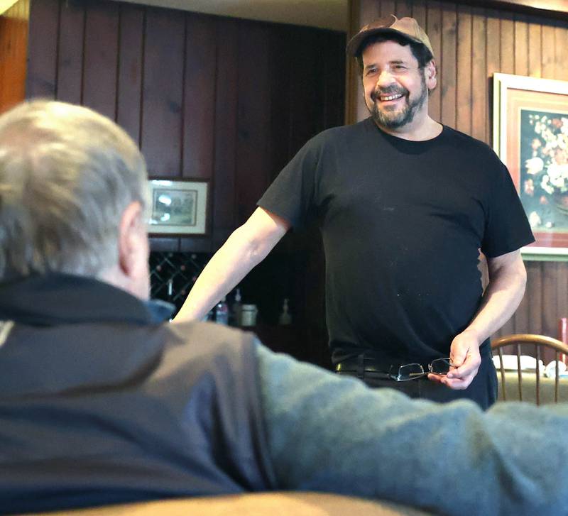 The Hillside Restaurant owner Gavin Wilson (right) talks to regulars Vincent Boone and Vicki Erwin, of DeKalb, Wednesday, Feb. 22, 2023, at eatery in DeKalb. Hillside will soon be closing its doors after 68 years in business.