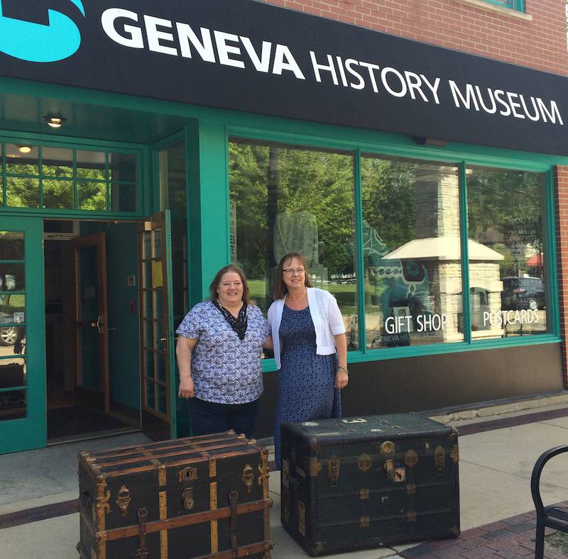 Margit Lundgren (left) stands with her sister Ingrid Erikson Rowlett as they donate two chests and other items to the Geneva History Museum on June 10.