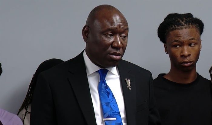 Attorney Benjamin Crump, the renowned civil rights lawyer who is representing the family of Sonya Massey, speaks at a news conference Tuesday alongside Massey’s son, Malachi Hill Massey.