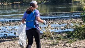 Oswego residents help pick up trash as part of It’s Our Fox River Day