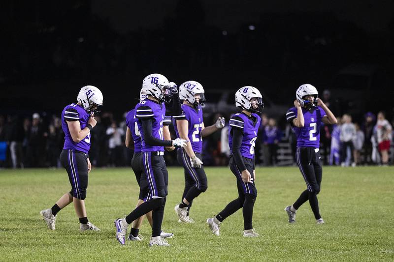 Dixon walks off the field after a one-point loss to Byron Friday, Oct. 18, 2024, at A.C. Bowers Field in Dixon.