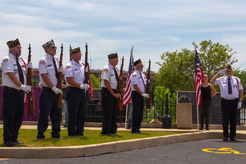 Veterans perform a rifle salute on Saturday, June 15, 2024, during the Illinois Motorcycle Freedom Run ceremony at the Middle East Conflicts Wall in Marseilles.