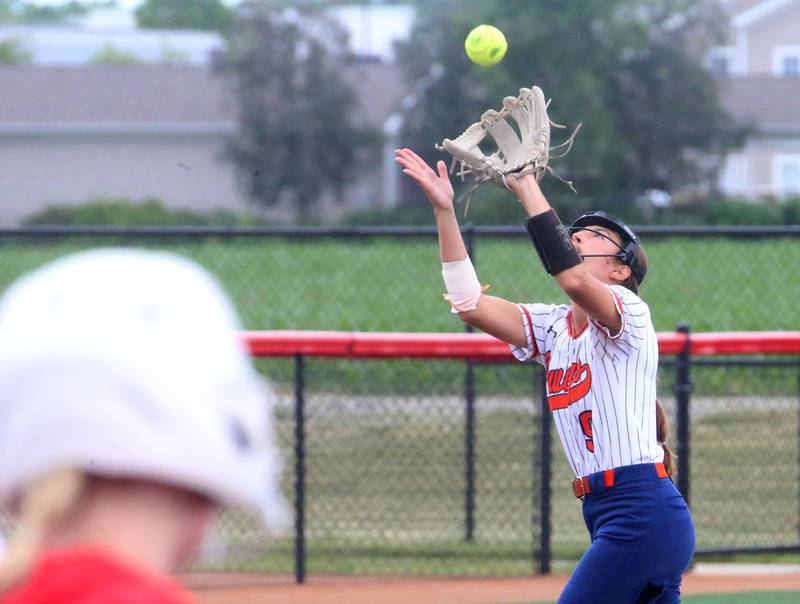 Oswego's Maddie Hernandez makes a catch to force out Mundelein's Kieley Tomas during the Class 4A third place game on Saturday, June 8, 2024 at the Louisville Slugger Sports Complex in Peoria.