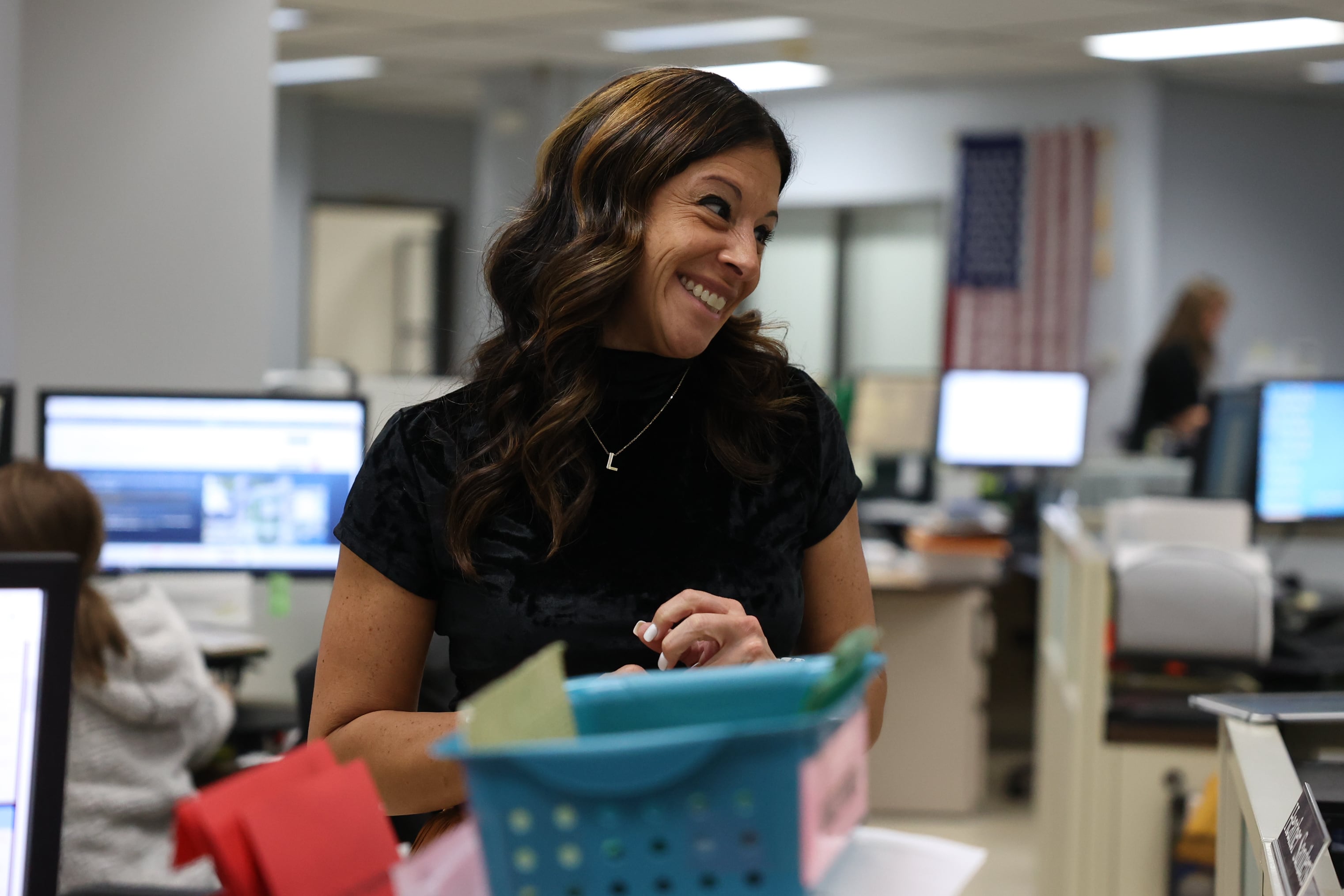 Will County Clerk Lauren Staley Ferry, who is running for re-election, makes her rounds at the Will County office on midterm election night on Tuesday.