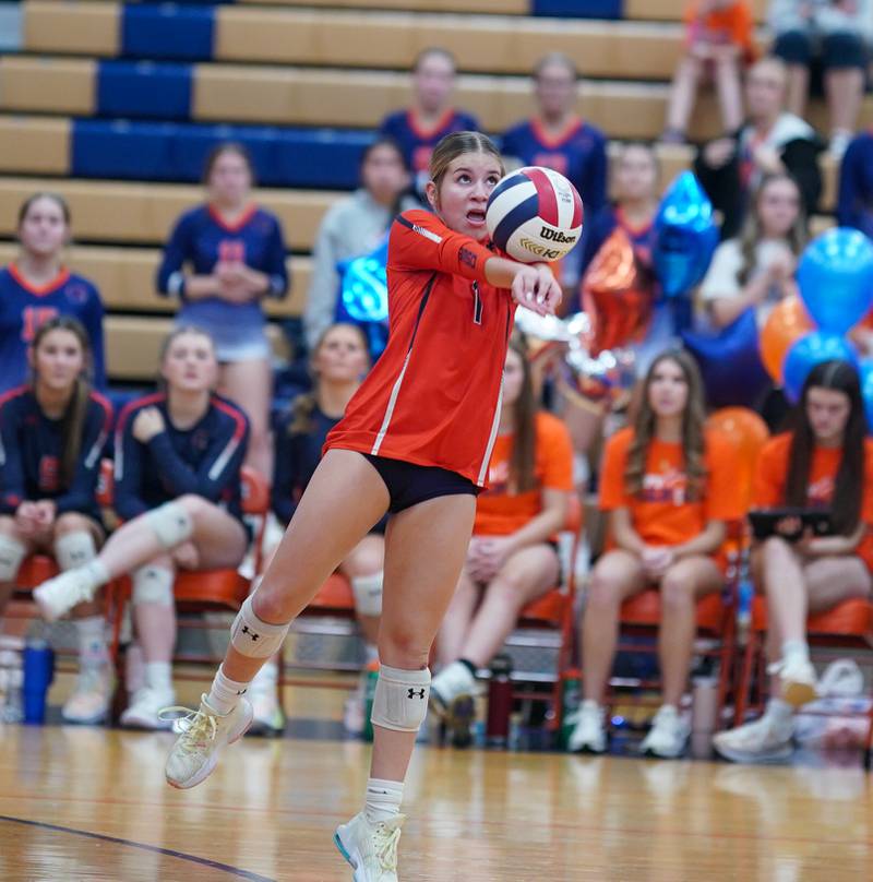 Oswego’s Alexis Terrazas (1) bump sets the ball against Romeoville during a volleyball game at Oswego High School on Tuesday, Oct. 17, 2023.