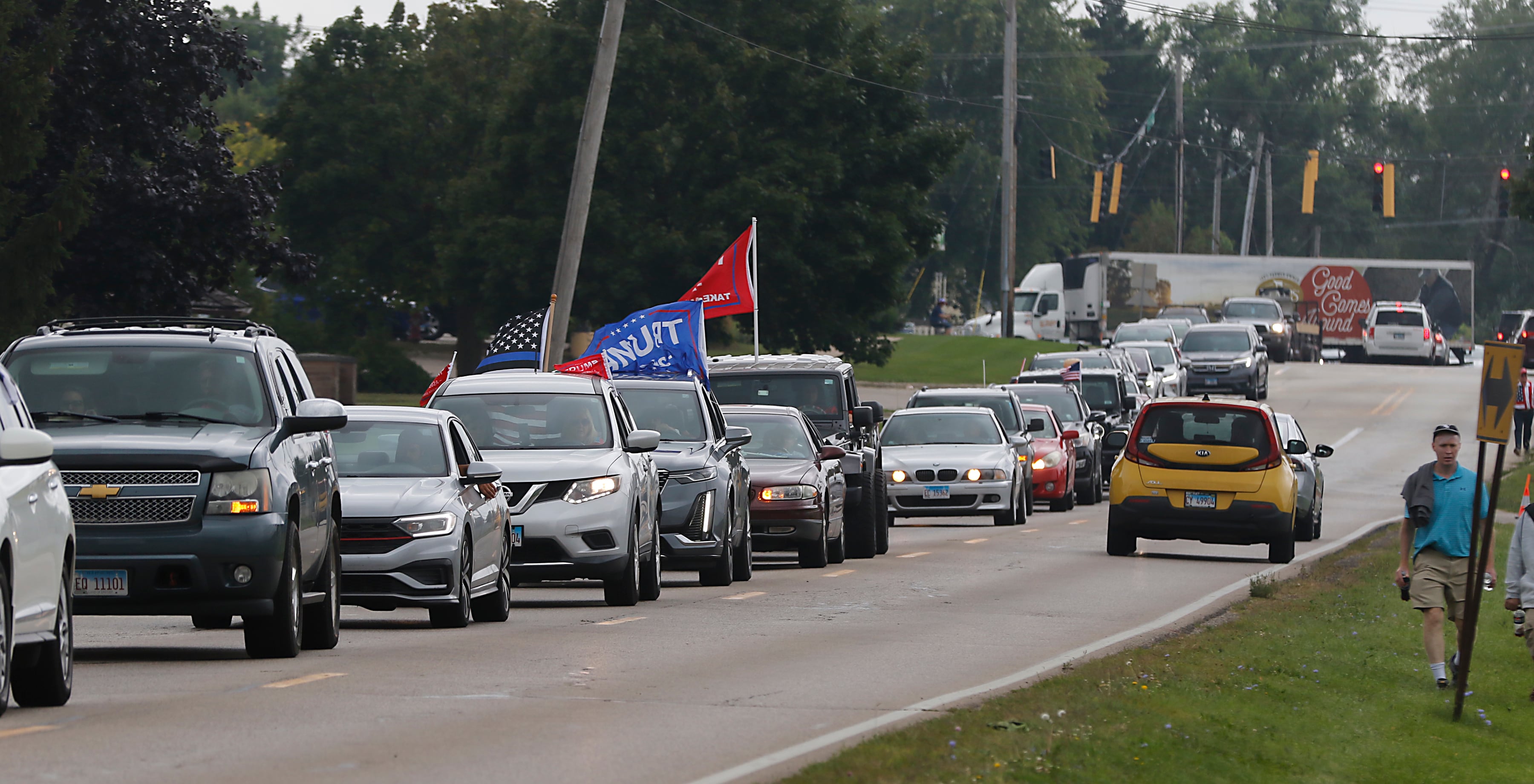 Traffic on Country Club Road are shown on the way to the Trump Now-Save the American Dream Rally at the McHenry County Fairgrounds on Sunday Aug. 18, 2024, in Woodstock.