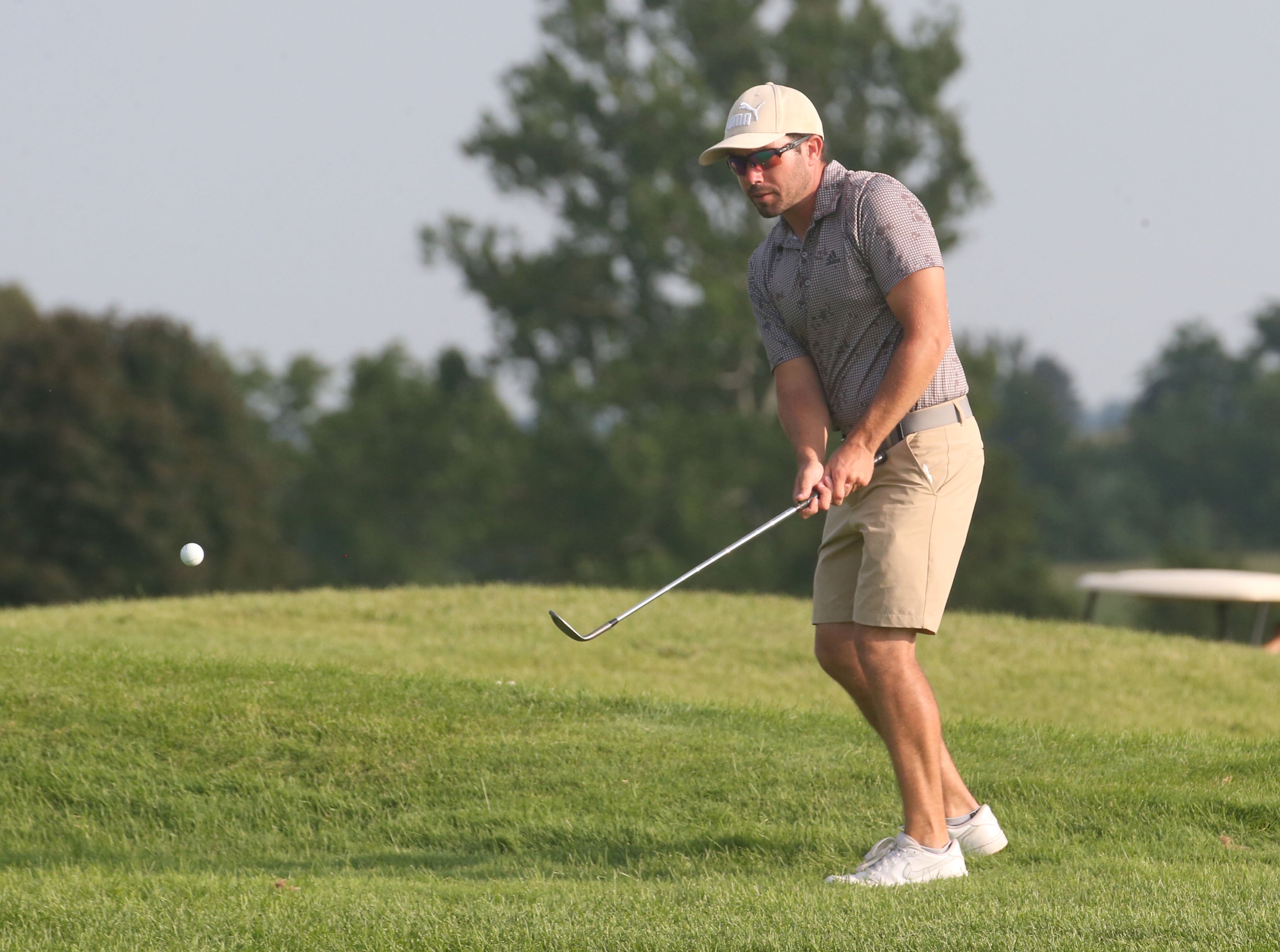 Mason Kimberley golfs on the 17th hole during the Illinois Valley Mens Golf Championship on Sunday, July 28. 2024 at Mendota Golf Club.