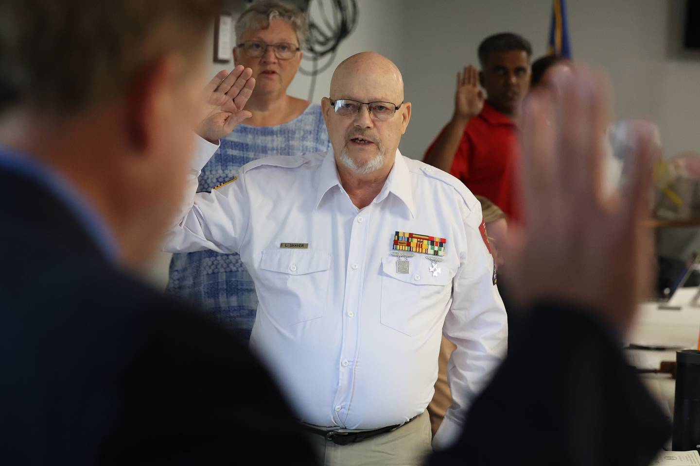 Larry Shaver, of AL Post 1288 in Bolingbrook, is sworn in as Sergeant in Arms of the Veterans Assistance Commission at the VFW Malcom J. Mayo Post 5422 in Wilmington on Tuesday, June 14, 2023.