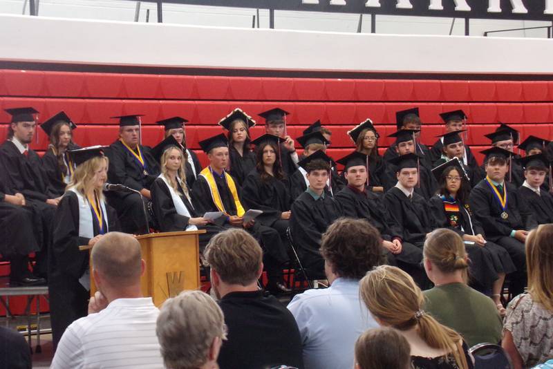 Emma Highland give a graduate address Sunday, May 19, 2024, to her fellow graduates at the Woodland High School ceremony.