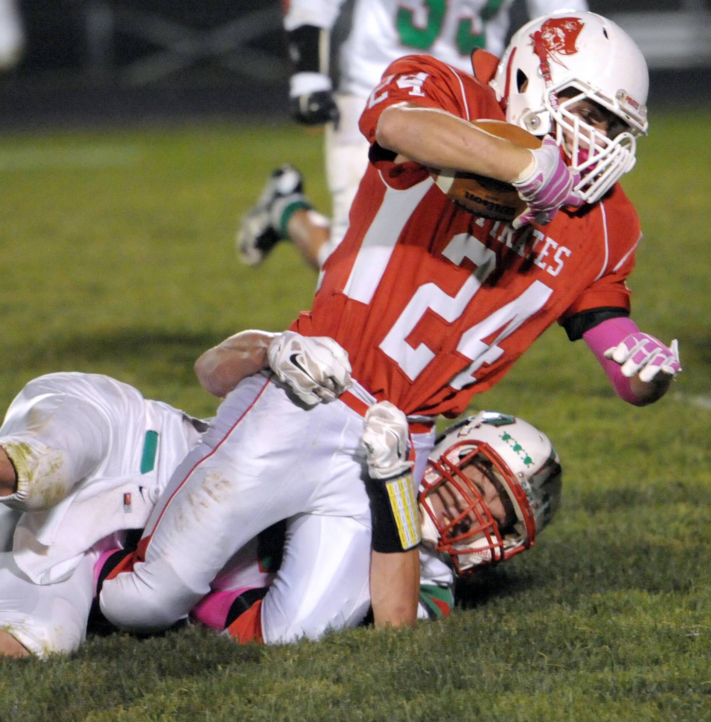 Ottawa's Weston Hoffman is brought down by a La Salle-Peru defender in the 2014 game.