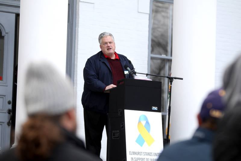 Vince Spaeth, president of the Elmhurst Park District Board of Commissioners, speaks as representatives from the City of Elmhurst, Elmhurst District 205, Elmhurst Park District, Elmhurst Public Library and Elmhurst University gathered with community members at Wilder Park in Elmhurst to show support for the people of Ukraine on Wednesday, April 6, 2022.