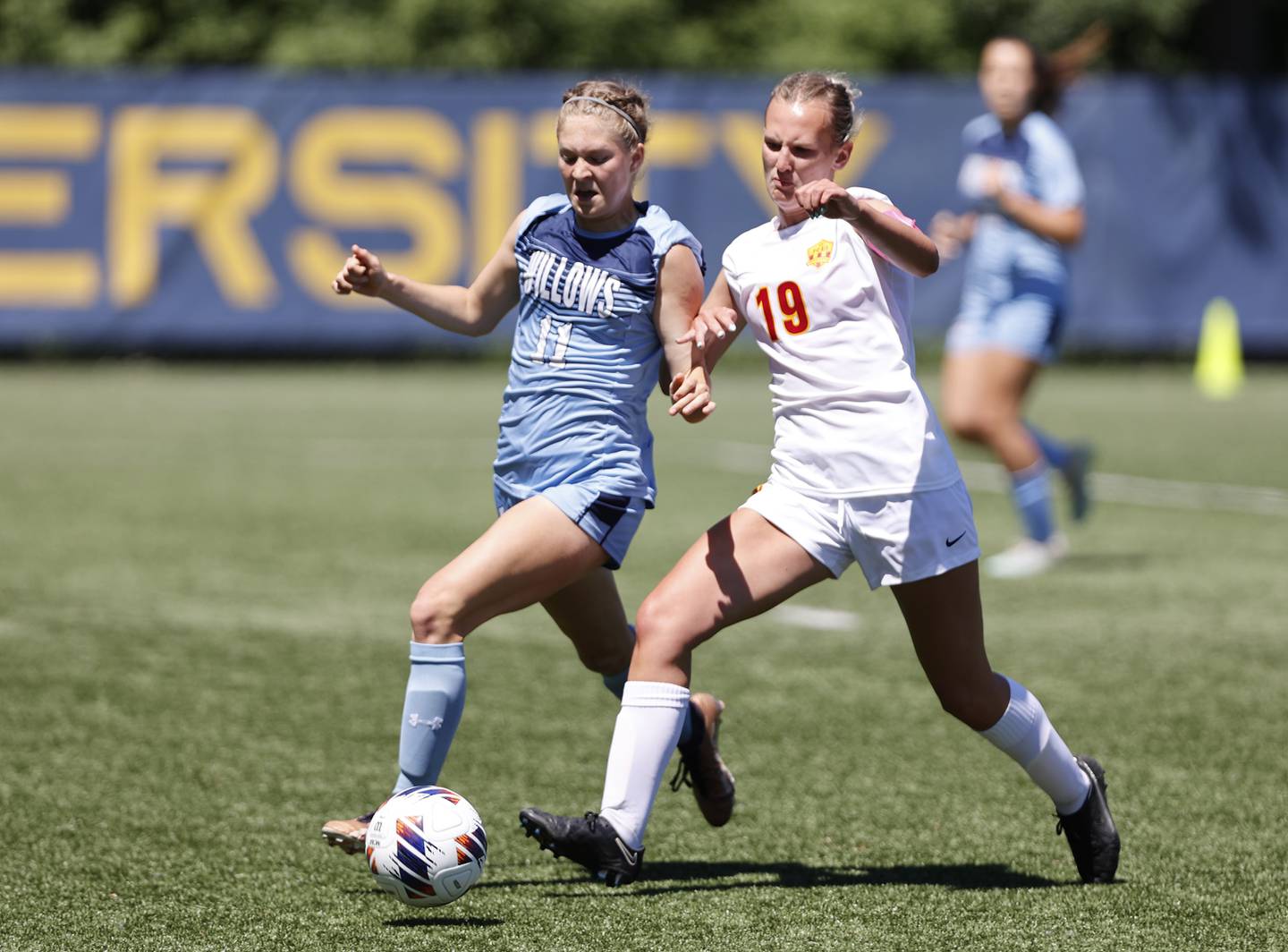 Willows' Julia Lechner (11) fights for the ball against Richmond-Burton's Layne Frericks (19) during the Class 1A Dominican super-sectional between Willows Academy and Richmond-Burton HS in River Forest on Saturday, May 25, 2024.