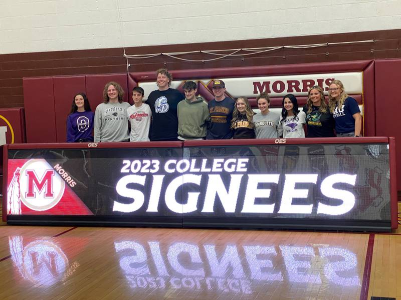 Morris Community High School's college signees from Tuesday evening. From left to right: Abby Henson, Ryan Wolenczuk, Kaden Welch, Justin Newman, Broc Grogan, Ashton Yard, Michaela Harlan, Maddy Rushing, Mariya Anderson, Kaiya Ziga and Kylee Claypool.