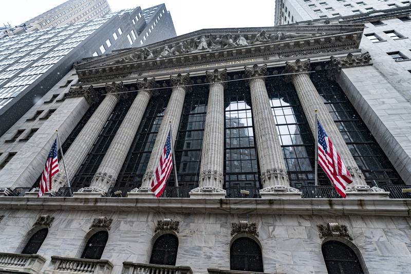 The exterior of the New York Stock Exchange is shown on Friday, Jan. 19, 2024, in New York. Wall Street is rising Friday and may break past its all-time high set two years ago, before the highest inflation and interest rates in decades sent financial markets tanking worldwide.  (AP Photo/Peter K. Afriyie)