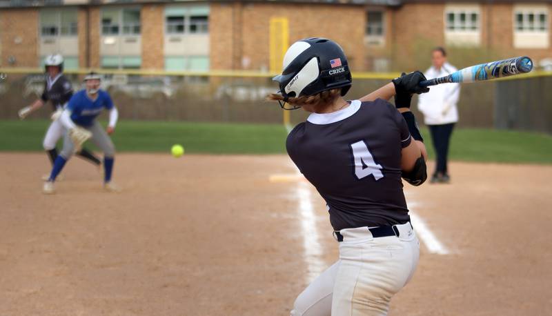 Cary-Grove’s Maddie Crick scorches a triple against Burlington Central in varsity softball at Cary Monday. With the triple, Crick hit for the cycle.