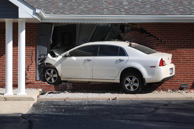 A car crashed into the Farkas Funeral Home on Wednesday morning in Joliet. According to a witness only the driver suffered minor injuries.