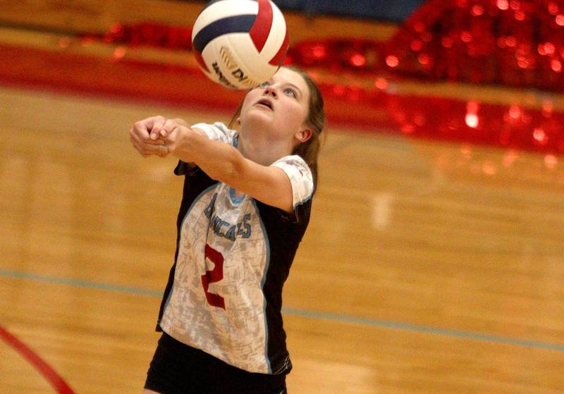 Marian Central’s Jillian Winkelman passes the ball against Grayslake North in girls volleyball in Woodstock Monday.