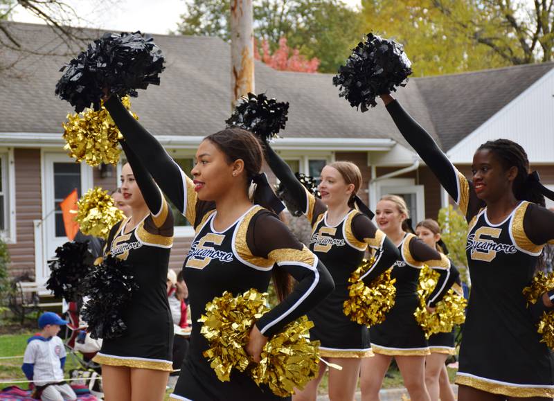 Members of the Sycamore High School Dance Team perform during the Sycamore Pumpkin Festival Parade, held Sunday, Oct. 31, 2021.