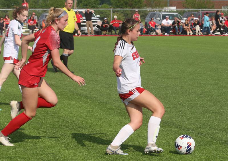 Streator's Kaelin Schuster kicks the ball away from Morton's Dru Muchler during the Class 2A Regional semifinal game on Wednesday, May 15, 2024 at the L-P Athletic Complex in La Salle.