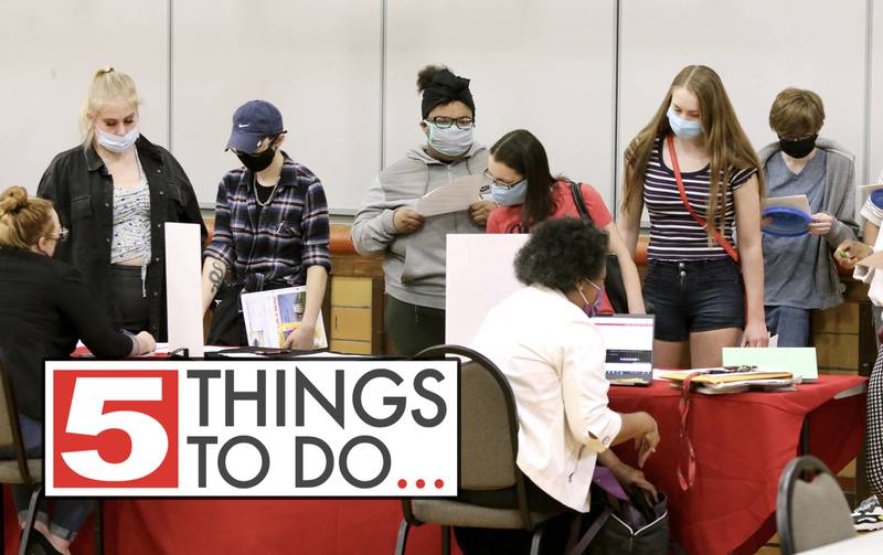 Shaw Local 2021 file photo – Attendees at the job fair sponsored by the DeKalb Chamber of Commerce and the DeKalb Park District check out one of the booths during the event at Haish Gymnasium.