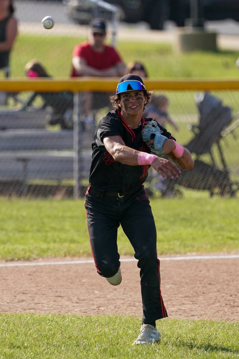 Yorkville's Jailen Veliz (12) fields a grounder and throws to first for an out against Neuqua Valley during a Class 4A Neuqua Valley Regional semifinal baseball game at Neuqua Valley High School in Naperville on Thursday, May 23, 2024.