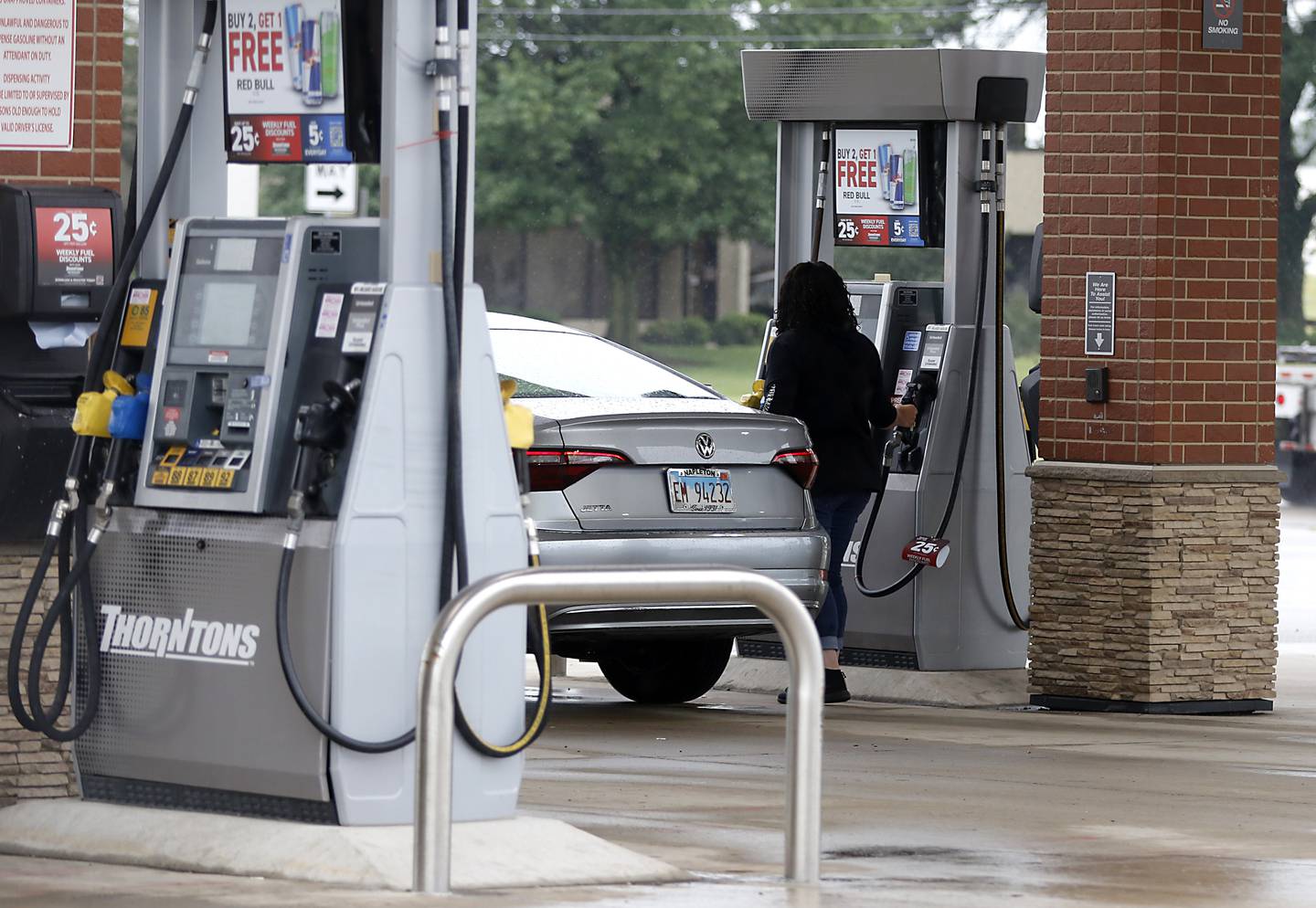 A woman pumps gas at the Thorntons convenience store on Illinois Route 31, in Crystal Lake  on Friday, June 28, 2024. The state gasoline take increases on Monday.